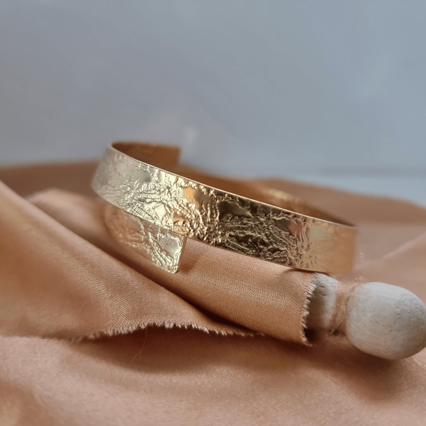 Heavy lace silver ribbon bangle - gold plate - The Studio at Wirksworth